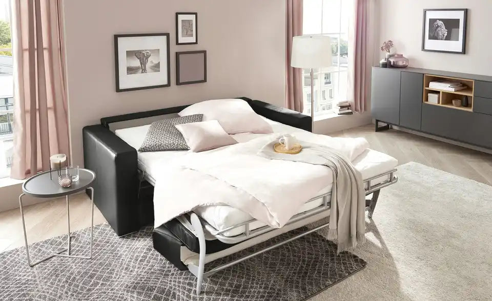 Betty Schlafsofa Betty Seitenansicht – Kaltschaum, Lattenrost, Leder Schwarz – Betty