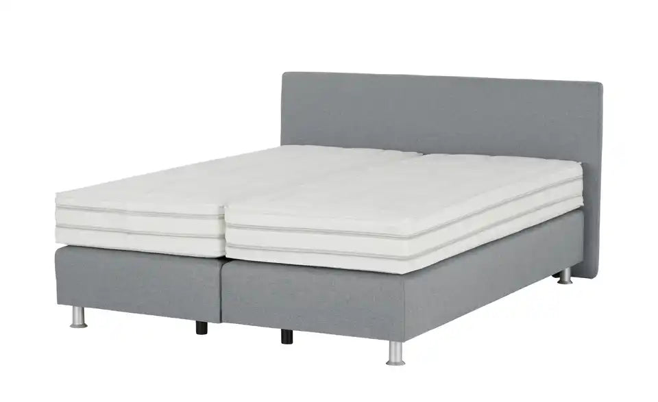 vanDoorn Boxspringbett Flexline 2.0 im Raum – modernes Schlafzimmer, chromatierte Metallfüße – vanDoorn