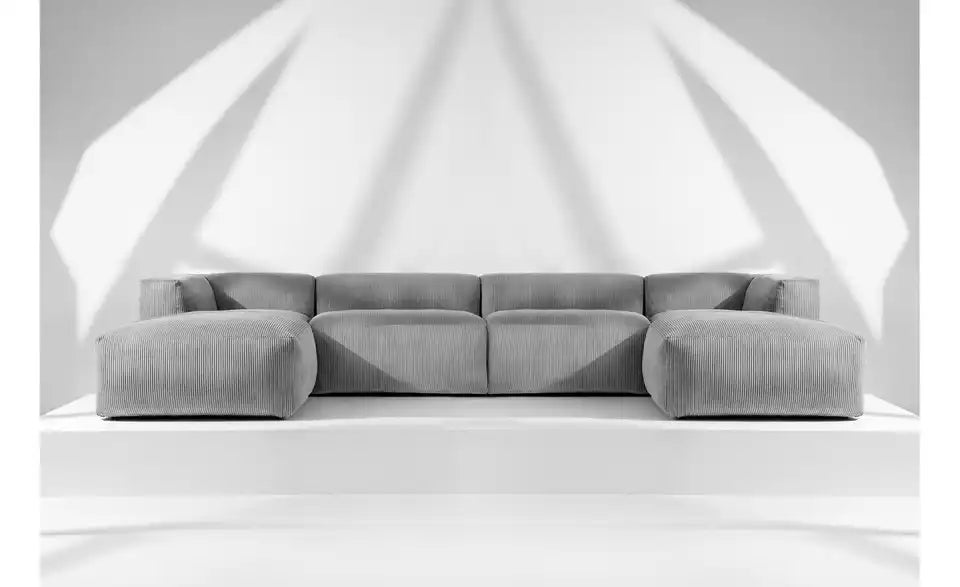 KONSIMO Wohnlandschaft Buffo Schräganasicht – frei im Raum stellbar, 9 Sitzer – KONSIMO