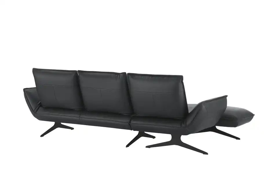 KOINOR Ecksofa Buddy Schraegansicht – Leder schwarz, Wellenunterfederung, Kufengestell Metall – KOINOR