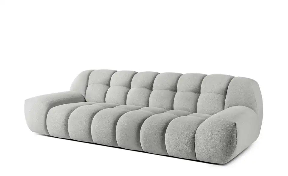 KONSIMO Vena Schraegansicht Hocker – Polsterhocker Boucle Hellgrau – KONSIMO